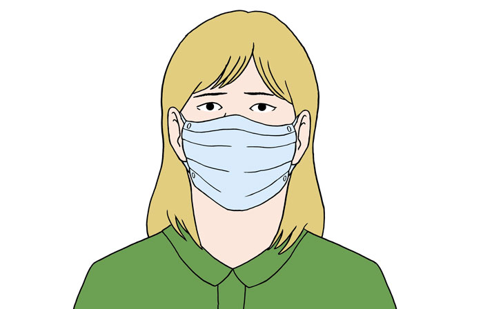 Eine Person trägt einen Mund-Nasen-Schutz.