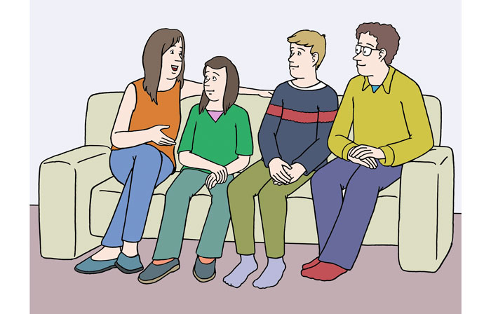Eine Familie auf dem Sofa
