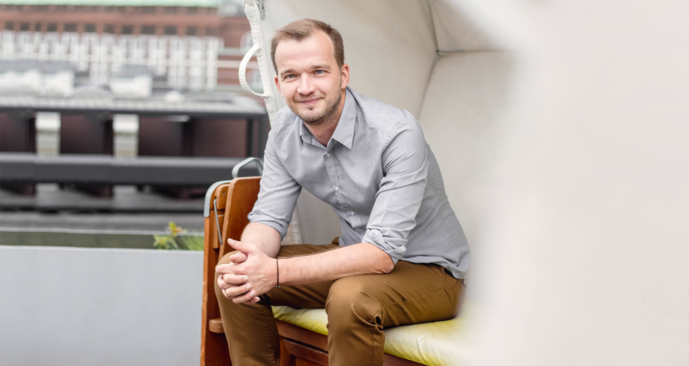 Sitzender Mensch