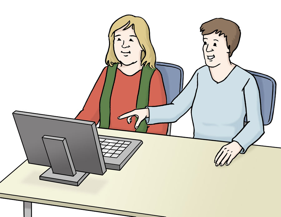 Zwei Frauen sitzen vor einem Monitor