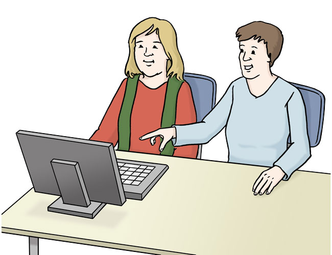 Zwei Menschen an einem Computer